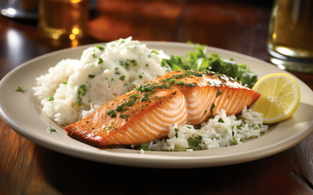 a plate of food with rice and fish